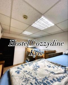 Postel nebo postele na pokoji v ubytování Hostel Cozzydine