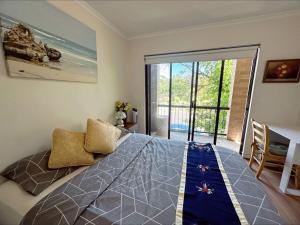 Ένα ή περισσότερα κρεβάτια σε δωμάτιο στο Himeji Garden 2 Bedrooms Apartment Free Wi-Fi