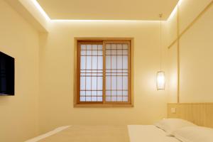 52 Designer B&B 객실 침대