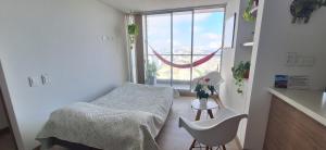Postel nebo postele na pokoji v ubytování Hermoso Apartamento exclusiva ubicación + 35 fotografií