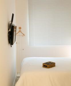 Postel nebo postele na pokoji v ubytování Busan Circle Stay Hotel