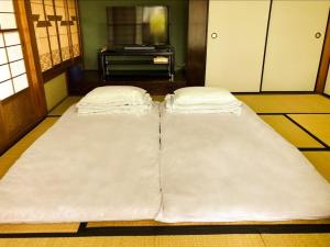 Letto o letti in una camera di BLO富津市大堀-Private Villa in Futtsu