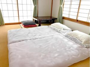 Letto o letti in una camera di BLO富津市大堀-Private Villa in Futtsu