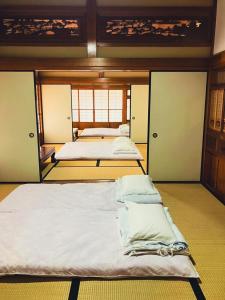 Letto o letti in una camera di BLO富津市大堀-Private Villa in Futtsu