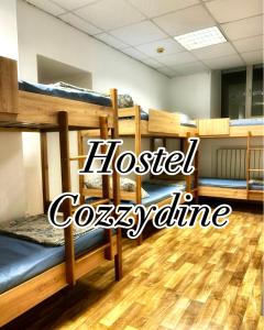 Postel nebo postele na pokoji v ubytování Hostel Cozzydine