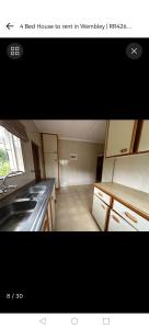 Kuchyň nebo kuchyňský kout v ubytování J & J's Paradise Guesthouse pmb