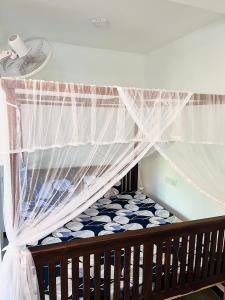 Postel nebo postele na pokoji v ubytování Wasana Ocean View Villa Mirissa
