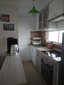 Dapur atau dapur kecil di Departamento playa los molles