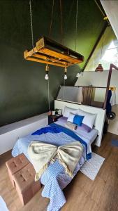 a bedroom with a bed in a tent at Flora Glamping de Abuela in Fortuna