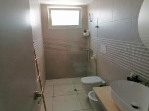 Koupelna v ubytování Estrella Dominicus Apartamento - Bayahibe + 28 fotografií