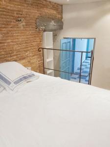 Postel nebo postele na pokoji v ubytování Appartement spacieux à Algajola + 8 fotografií