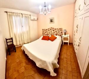 Ένα ή περισσότερα κρεβάτια σε δωμάτιο στο Departamento Plaza Centro