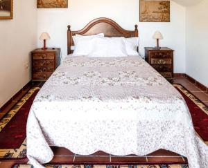 a bedroom with a bed and two night stands at Charming House in Fornos with shared pool in Fornos +16 photos