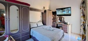 Μια τηλεόραση ή/και κέντρο ψυχαγωγίας στο Villacool - Lot No 1 - Résidence Le Tamier