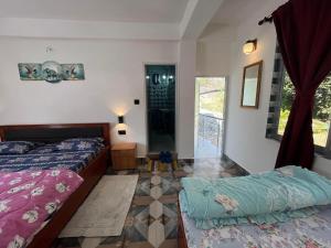 Postel nebo postele na pokoji v ubytování Lake Side Homestay - Pradhan Homestay Mirik