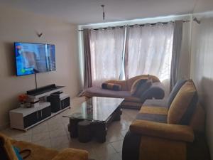 TV a/nebo společenská místnost v ubytování Ram appointment + 6 fotografií