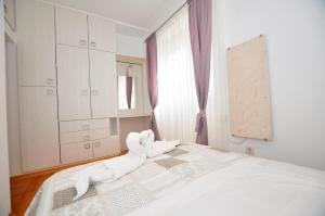 Postel nebo postele na pokoji v ubytování Apartment Balcony