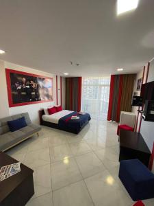 Uma cama ou camas num quarto em Rock Hotel First Line