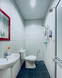 Ένα μπάνιο στο Roomstay TBK