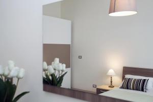 Posteľ alebo postele v izbe v ubytovaní Apartment Corso Cavour