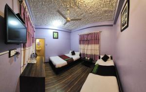 Hotel Ivy tesisinde bir televizyon ve/veya eğlence merkezi