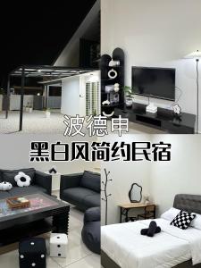 a living room with a couch and a tv at Jan2025 New Reno De Blackwood Home in Port Dickson