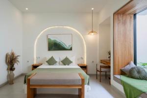 Ένα ή περισσότερα κρεβάτια σε δωμάτιο στο Casa Fiori Villa by Betterplace +25 φωτογραφίες