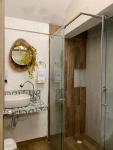 Koupelna v ubytování Almabella Hotel