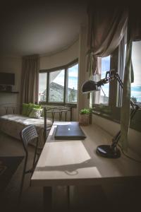 Postel nebo postele na pokoji v ubytování Hotel Marathia