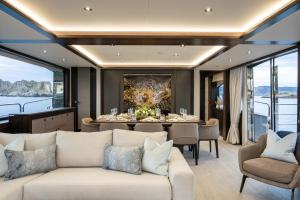 a living room and dining room on a yacht at Luxusyacht Mallorca in Portals Nous