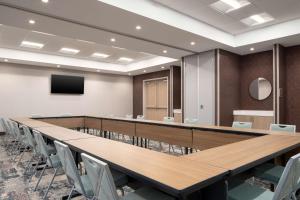 a large conference room with a long table and chairs at Homewood Suites By Hilton Goldsboro in Goldsboro