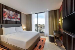 Doubletree By Hilton Amman Hotel & Residences客房内的一张或多张床位