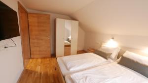 Postel nebo postele na pokoji v ubytování Ferienwohnung Steintal