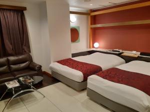 Postel nebo postele na pokoji v ubytování Hotel Moana Otsuka (Adult Only)