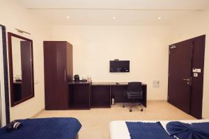 TV a/nebo společenská místnost v ubytování Hotel VANSHIVAT