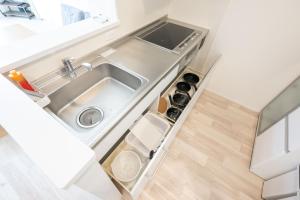 Η κουζίνα ή μικρή κουζίνα στο 駅徒歩4分 2LDK apartment +18 φωτογραφίες