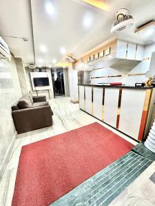 Kuchyň nebo kuchyňský kout v ubytování Hotel Amrit Villa