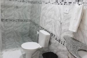 Koupelna v ubytování Pousada Das Palmeiras
