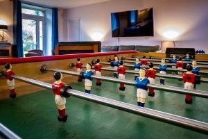 a group of lego men playing a game of bowling at PARENTHESE 30 COUCHAGES SUR 2 GITES PISCINE 1H30 Paris CAMPAGNE CHIC in Conflans-sur-Loing