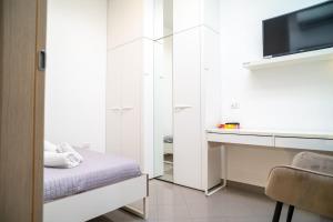 TV a/nebo společenská místnost v ubytování Spacious accommodation with fast Wi-Fi and private terrace