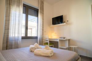 Postel nebo postele na pokoji v ubytování Spacious accommodation with fast Wi-Fi and private terrace