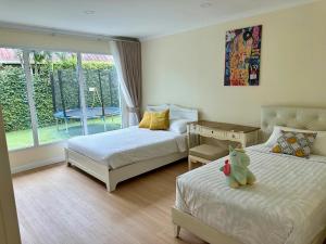 Postel nebo postele na pokoji v ubytování Dolce Vita Villa Memory Bang-Tao Phuket + 24 fotografií