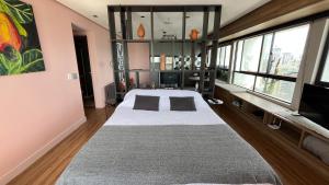 Postel nebo postele na pokoji v ubytování Flat Boa Viagem Recife Navegantes + 27 fotografií