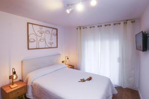 Katil atau katil-katil dalam bilik di PARAISOL 3 Planet Apartment +21 gambar