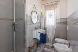 Ένα μπάνιο στο Homiday - Villa Perla dei Nuraghi