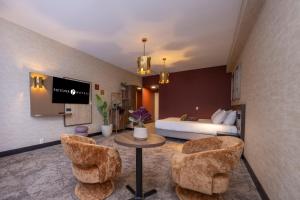 Posezení v ubytování Fletcher Hotel-Restaurant Klein Zwitserland