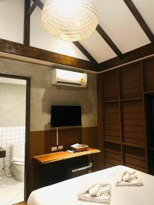 Tali-Yailai Hostel客房内的一张或多张床位