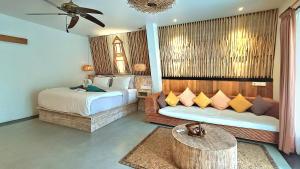 Postel nebo postele na pokoji v ubytování Kies Villas Lombok