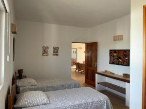Postel nebo postele na pokoji v ubytování Villa sol e mar