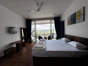 Voodi või voodid majutusasutuse Wooton Peak Resort toas